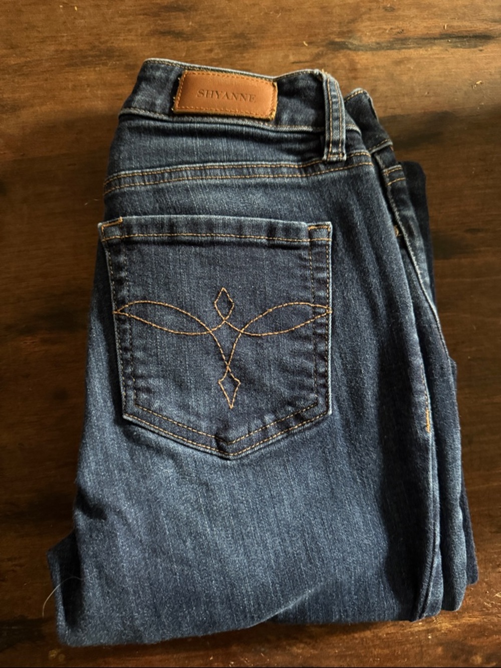 EUC Women's Dark Blue bootcut Jeans with Embroidered Back Pocket